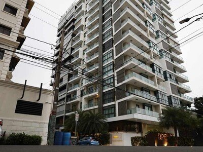 Así fueron hallados sin vida mujer y su hijo en una torre de Piantini